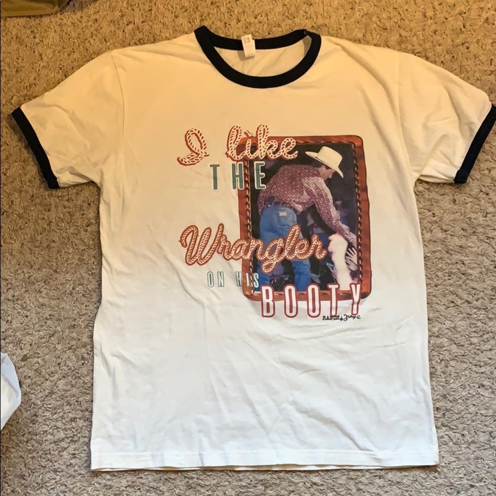 “I like the wrangler on his booty” shirt.